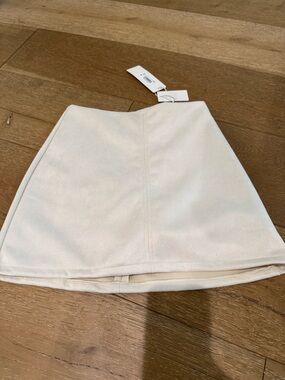 Altar'd State Cream Structured A-Line Mini Skirt. Built in shorts. Nice stretch.